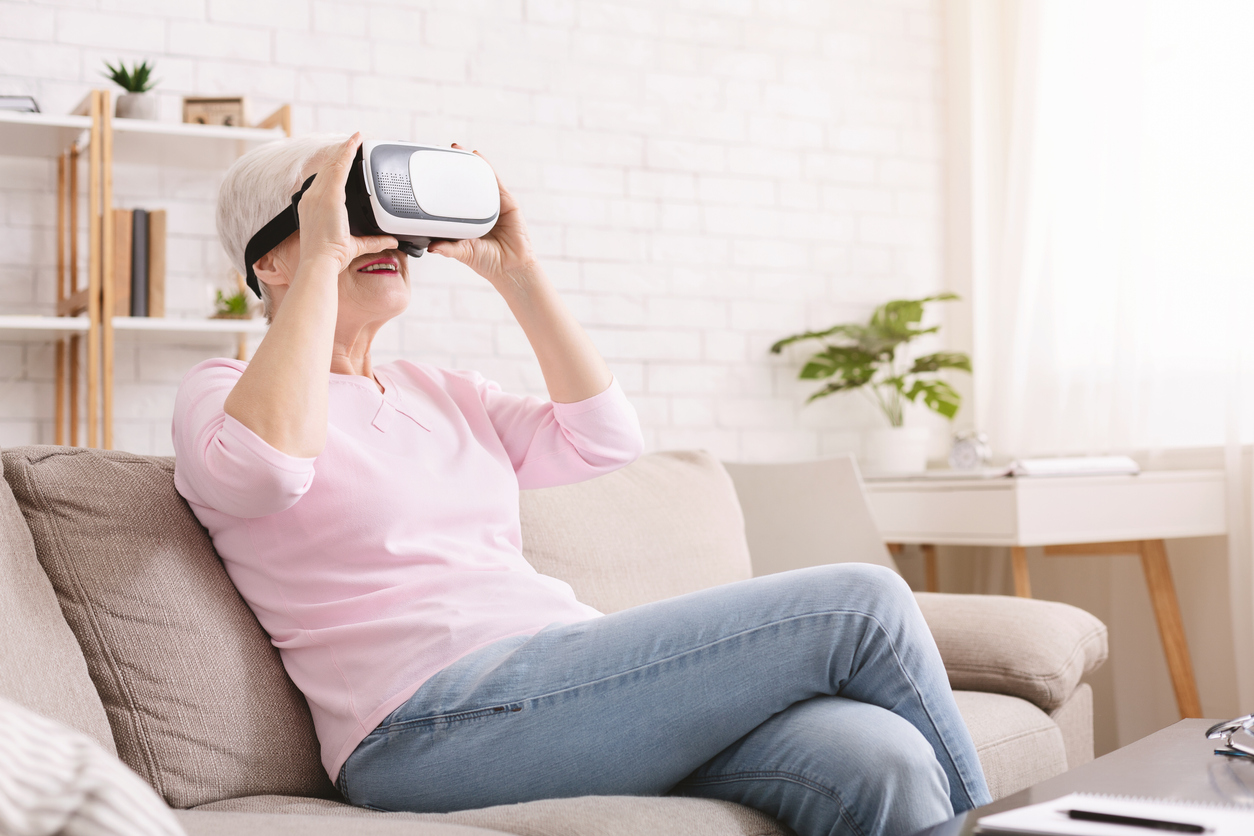 Woman looking through virtual reality glasses