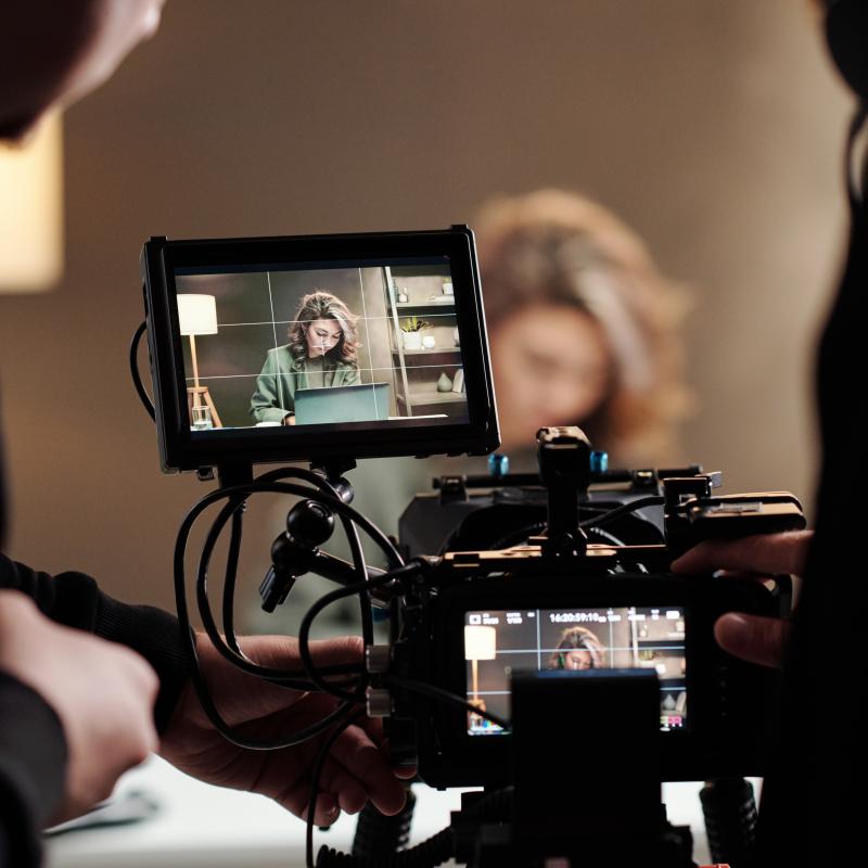 Woman behind camera 