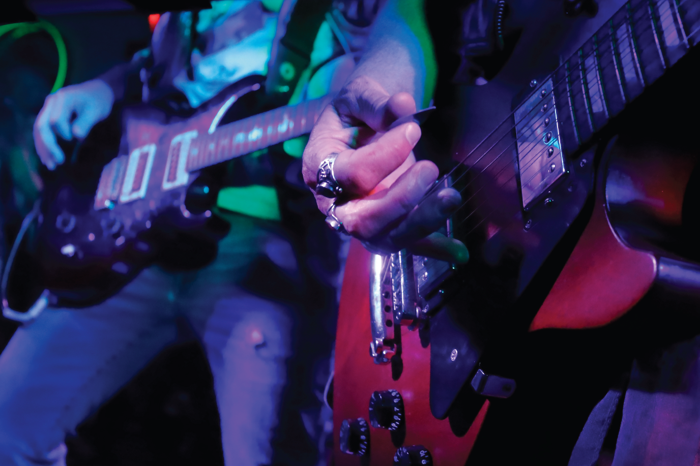 Musician playing an electric guitar