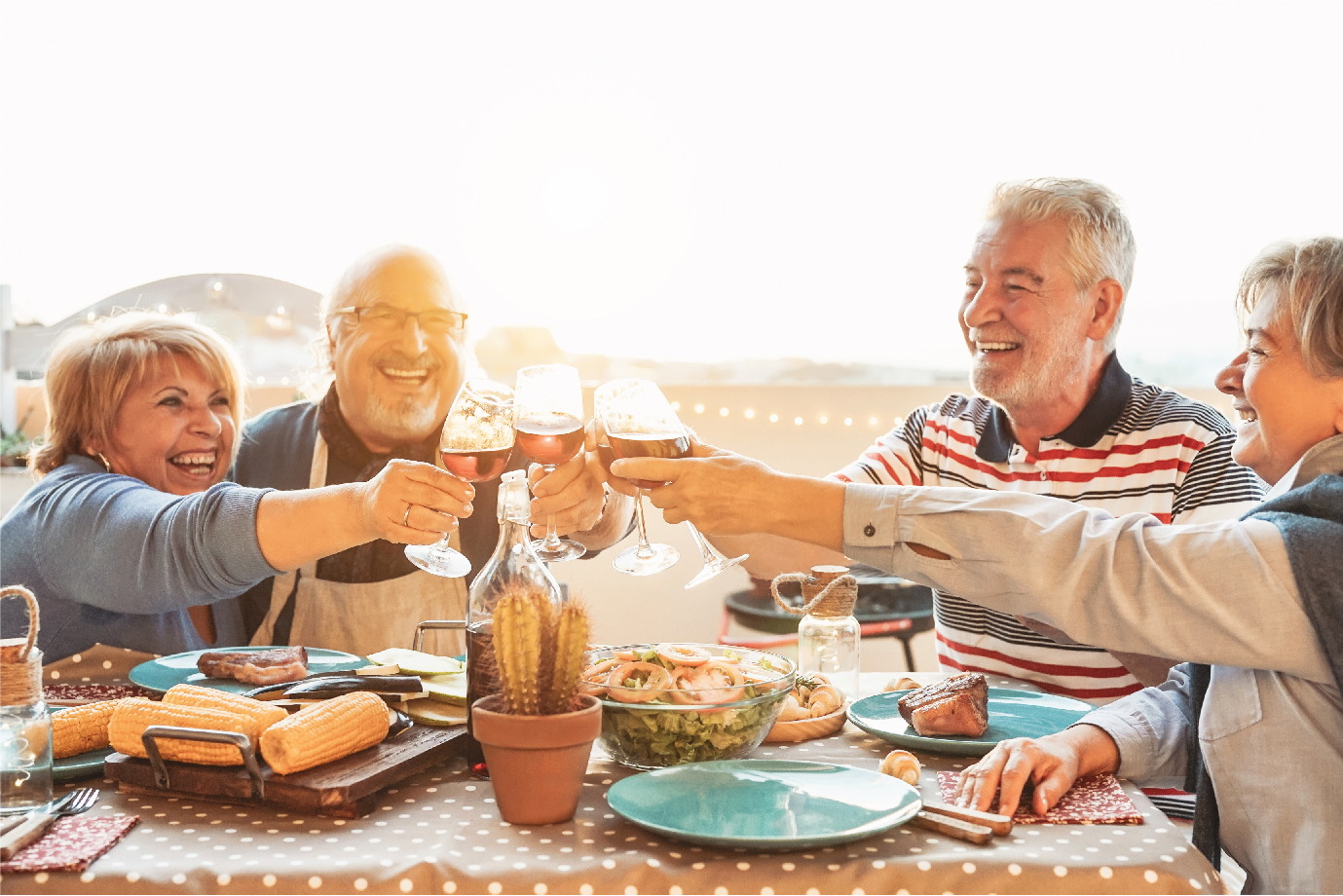 A group of senior citizens happily dining together