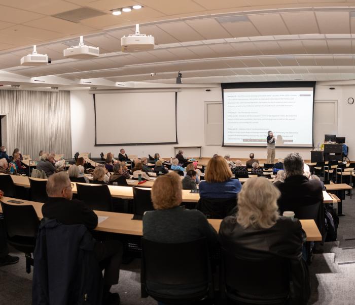 Prospective OLLI students attending an OLLI course preview in a lecture hall on the Sonoma State campus