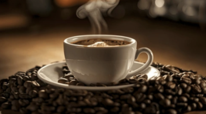 coffee cup sitting on beans