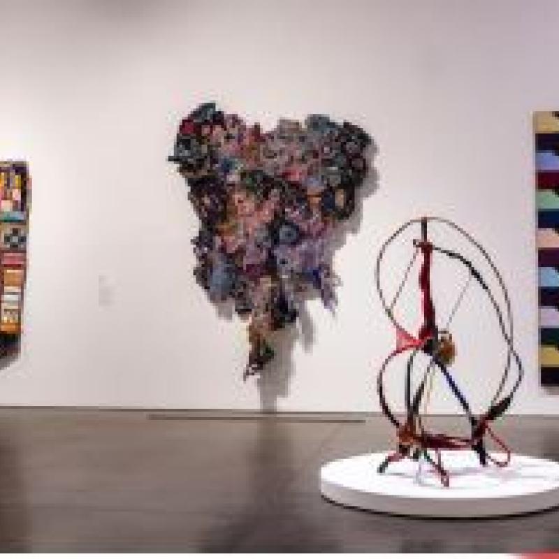 Four museum exhibits consisting of ethnic art