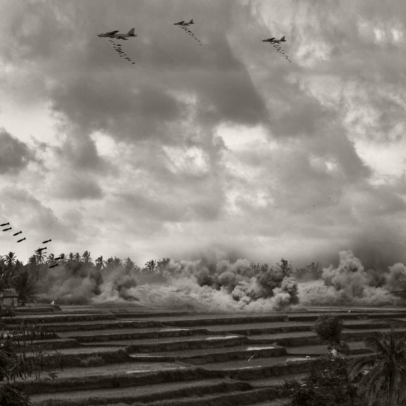 black and white image of planes dropping bombs